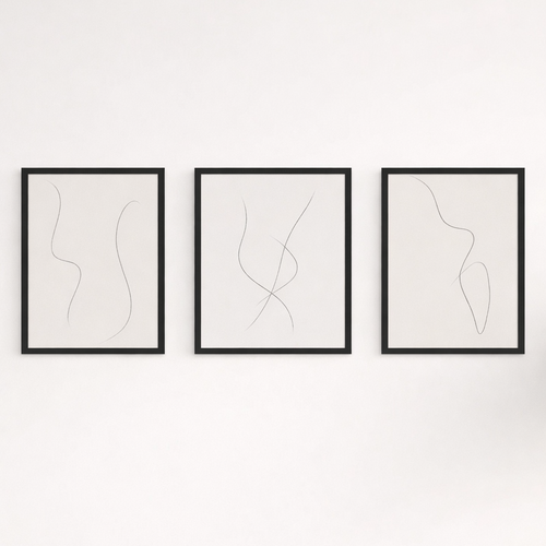 Three framed abstract line art pieces on a white wall